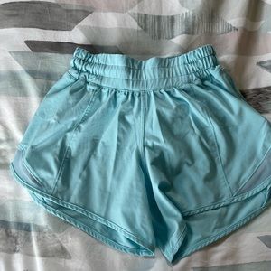Lululemon 4” hotty hot, teal in size 0